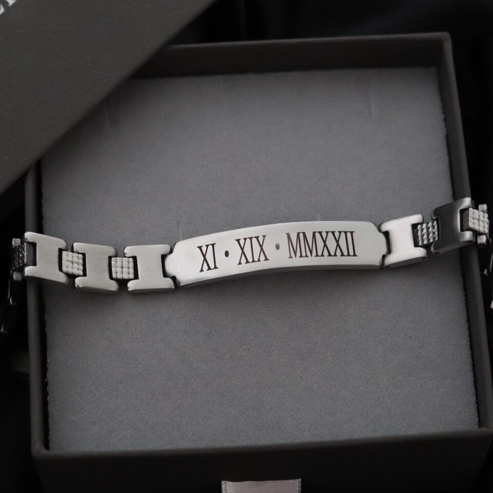 A bracelet for men with an engraved band