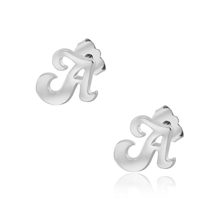 Silver letter-shaped earrings reflecting detailed craftsmanship