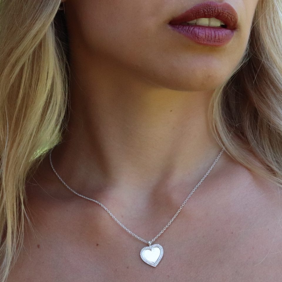 A necklace with inlaid heart pendant