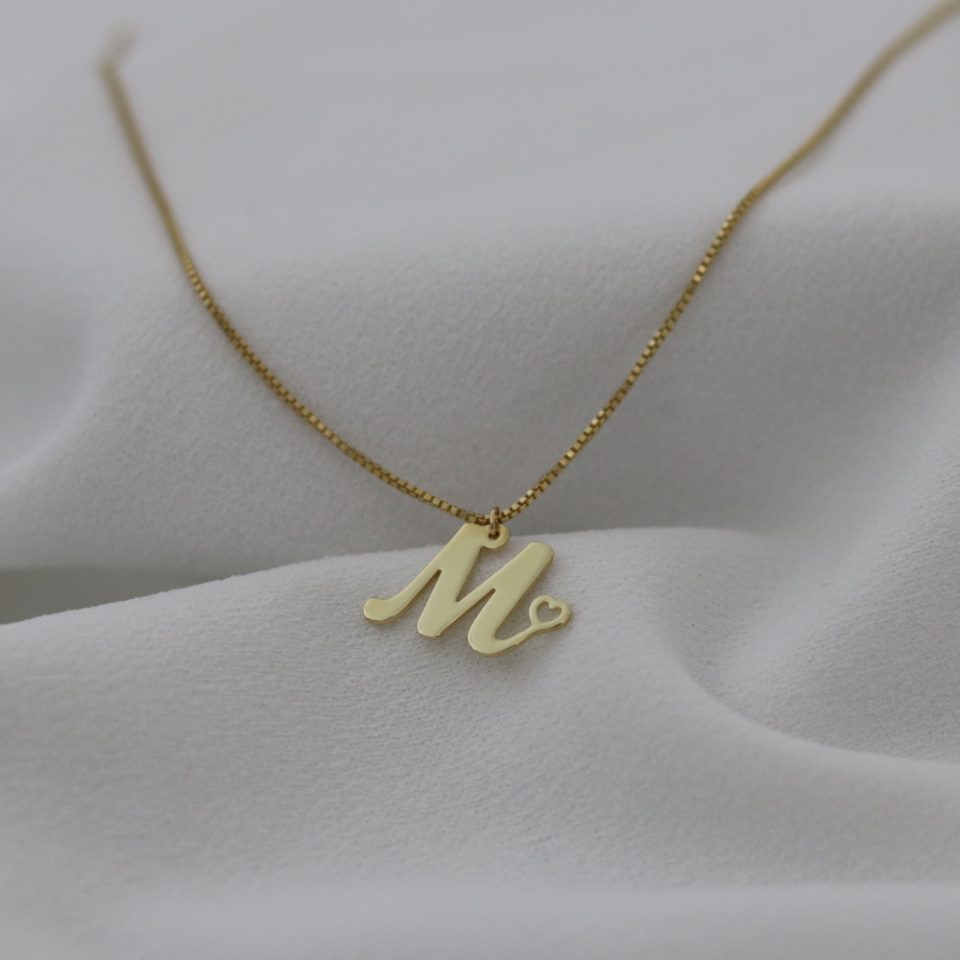 letter pendant with a heart