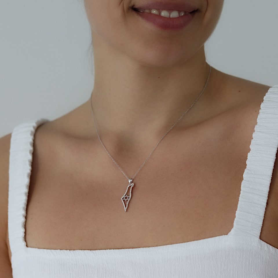 The Land of Israel necklace is inlaid with silver