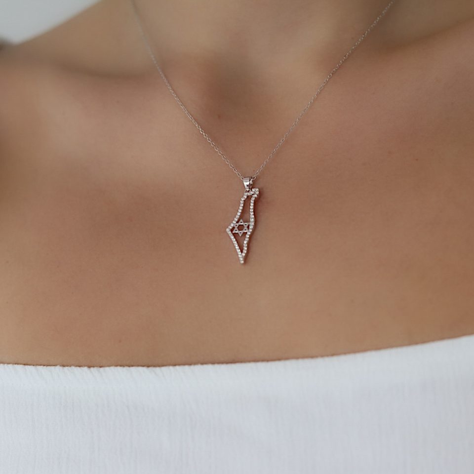 A map of Israel necklace inlaid with silver